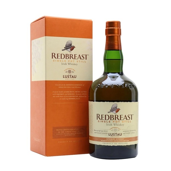 Redbreast Lustau Edition Single Pot Still Irish whiskey in an orange box with a cream label and a cream label on a green bottle.