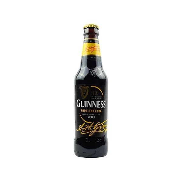Guinness Foreign Extra Stout n a black bottle with gold and white text.