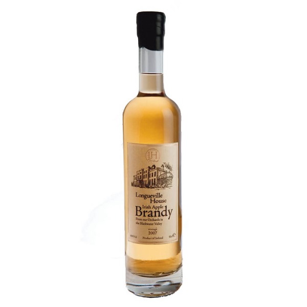 Longueville House Irish Apple Brandy in a golden colour with a cream label and black and gold text.