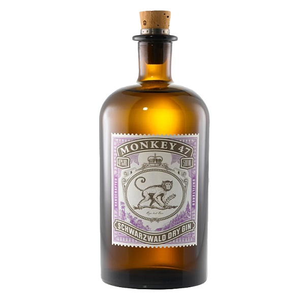 Monkey 47 Gin in a brown bottle with a monkey on a white label and purple and black text.
