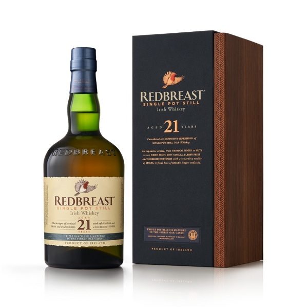 Redbreast 21 Year Old Single Pot Still in a green bottle with a cream label and a brown and navy box with gold text.