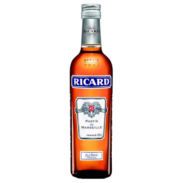 Ricard Pastis in a brown bottle with a blue and white label.