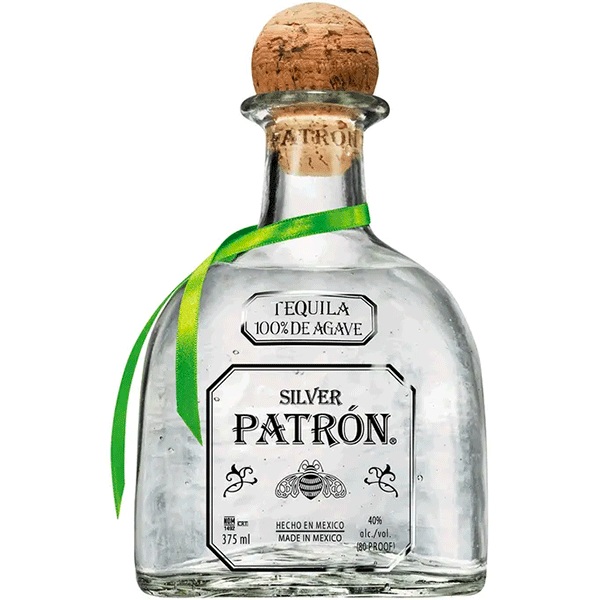 Patrón Silver tequila in a clear bottle with a clear label, black text and a round cork.