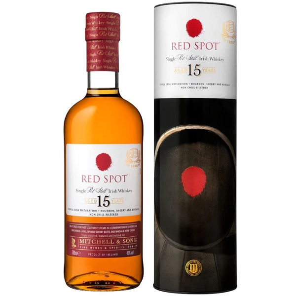 Red Spot 15 Year Old Single Pot Still Irish whiskey in a white and black tin and a red and white label on bottle.