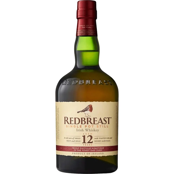 Redbreast 12 Year Old Single Pot Still in a green bottle with a bird on a cream label and red text.