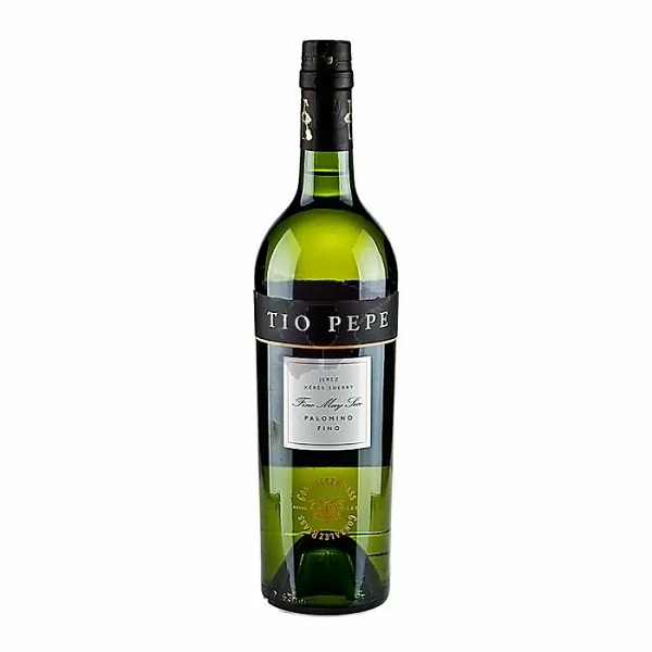 Tio Pepe Sherry in a green bottle with a black and white label.