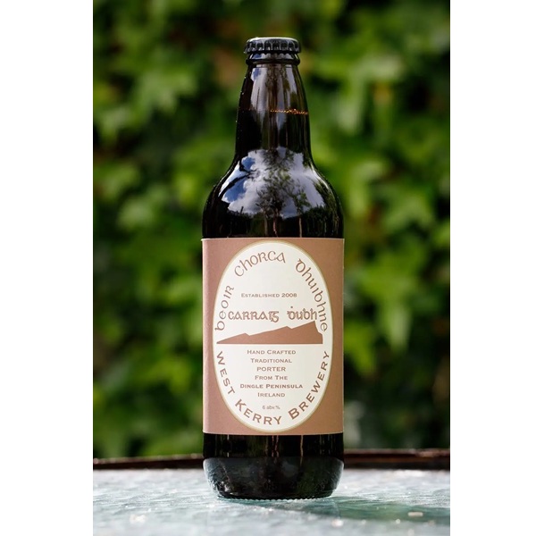 West Kerry Brewery Carraig Dubh Porter in a brown bottle with a brown and cream label.