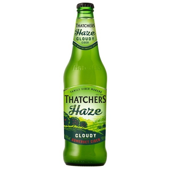Thatchers Haze Cloudy cider in a green bottle with a green label.