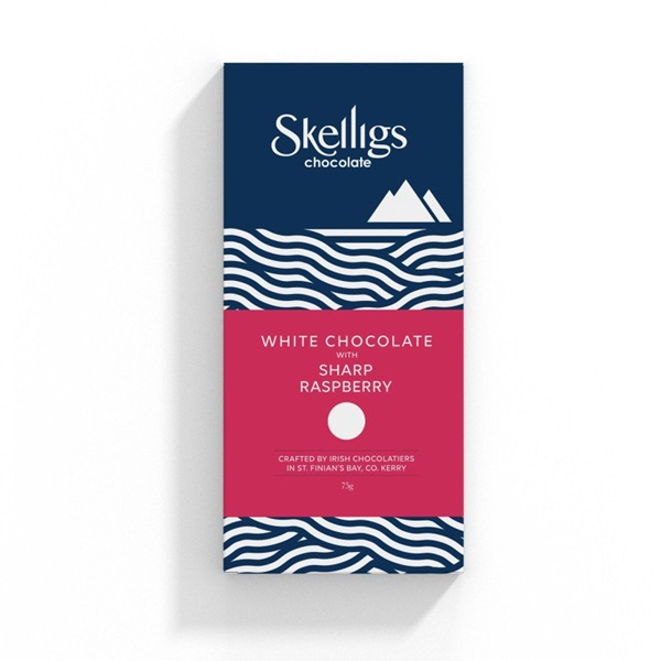 Skelligs Chocolate White Chocolate Bar with Sharp Raspberry in a navy and pink card pack.