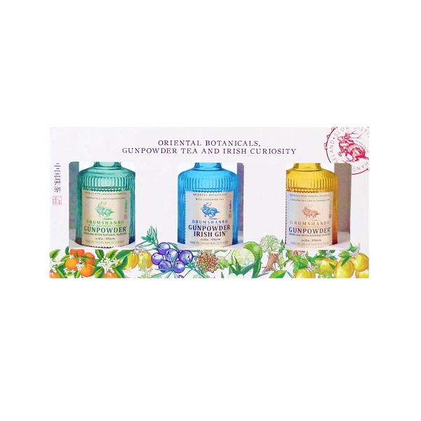 Drumshanbo Gunpowder Irish Gin Miniature Trio Set in a white card cover with flowers and three miniature gin bottles in green, blue and yellow.