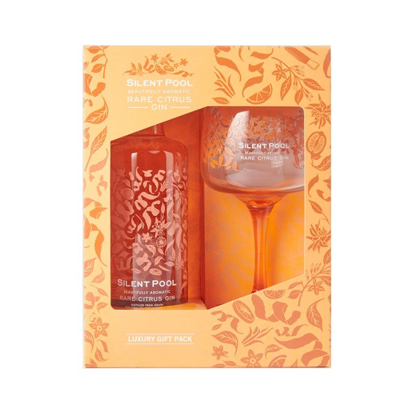 Silent Pool Citrus Gin Gift Set in an orange box with a gin glass and a bottle of orange colour gin.
