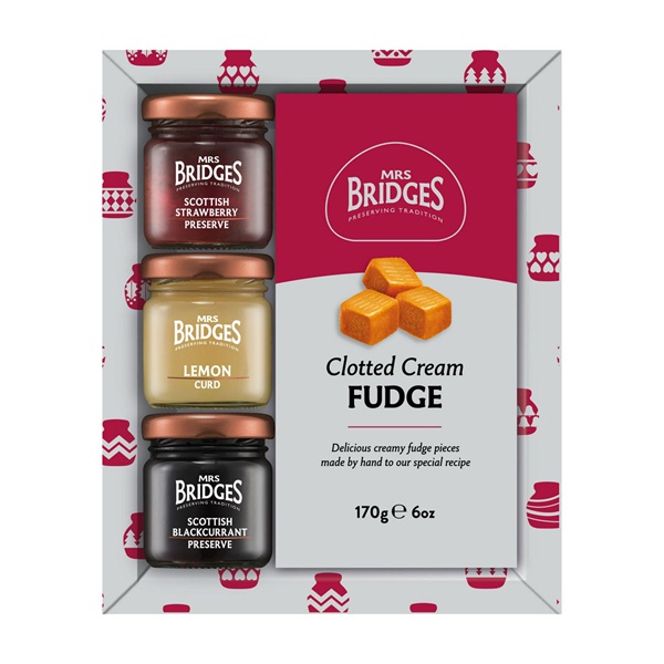 Mrs Bridges Clotted Cream Fudge & Mini Preserves Set in a white card box with three mini jars of preserves and a red and white box of fudge.