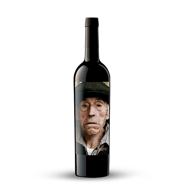 Matsu El Viejo in a dark bottle with the face of an elderly man wearing a hat on the labe.