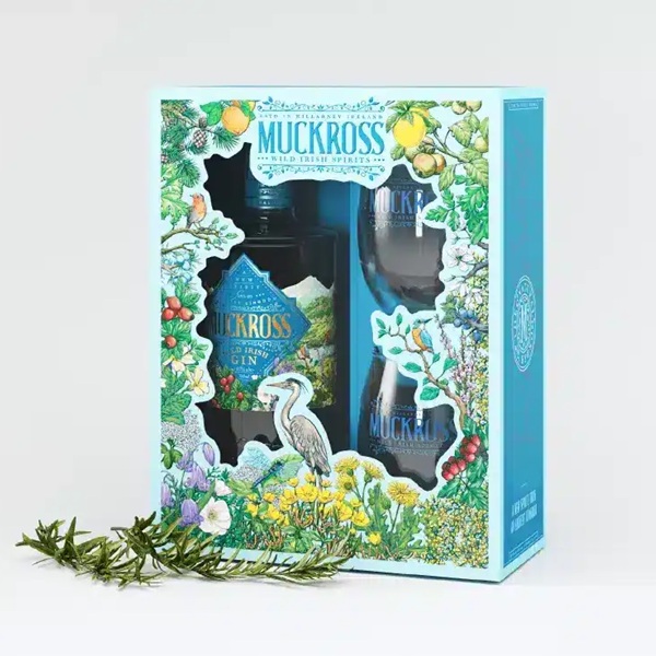 Muckross Wild Irish Gin Gift Set with a bottle and two glasses in a blue box covered in flowers.